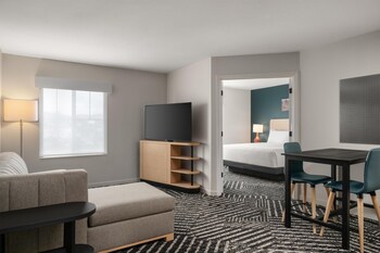 Suite Exécutive, en angle | Literie de qualité supérieure, coffres-forts dans les chambres, bureau