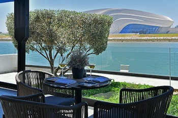 Breakfast, lunch, dinner served; Mediterranean cuisine, pool views 