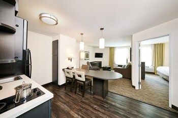 Studio Suite, 2 Double Beds | 1 bedroom, desk, blackout drapes, iron/ironing board