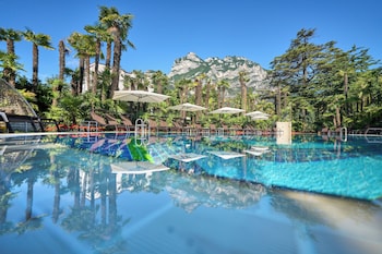 Seasonal outdoor pool, open noon to 7:00 PM, pool umbrellas