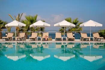 Indoor pool, 2 outdoor pools, open 10:00 AM to 6:30 PM, pool umbrellas
