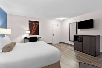Standard Room, 1 Queen Bed, Non Smoking, Refrigerator & Microwave | Desk, laptop workspace, blackout drapes, iron/ironing board