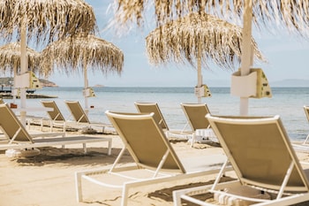 Private beach nearby, sun loungers, beach umbrellas, rowing