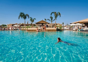 Indoor pool, outdoor pool, pool umbrellas, sun loungers