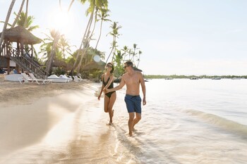 Private beach, white sand, sun loungers, beach umbrellas