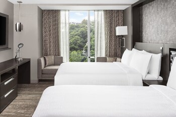 Relax in style with a panoramic city view, comfortable seating, and a beautiful view.