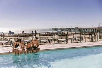 Outdoor pool, pool umbrellas, pool loungers