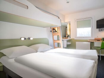 Chambre avec lits jumeaux | Bureau, rideaux dâobscurcissement, systĂšme dâinsonorisation
