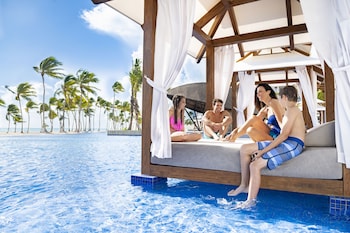 4 outdoor pools, open 9:00 AM to 7:00 PM, cabanas (surcharge)