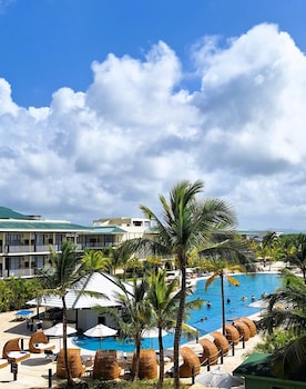 2 outdoor pools, pool umbrellas, sun loungers