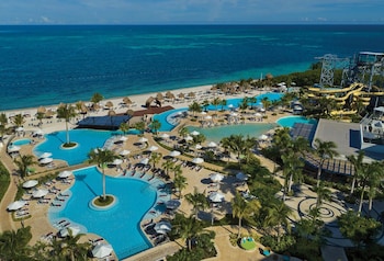 4 outdoor pools, open 8:00 AM to 9:00 PM, pool cabanas (surcharge)