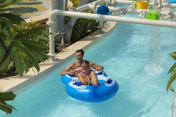 4 outdoor pools, open 8:00 AM to 9:00 PM, cabanas (surcharge)
