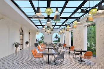 Outdoor pool, open 7:00 AM to 9:00 PM, pool umbrellas, sun loungers