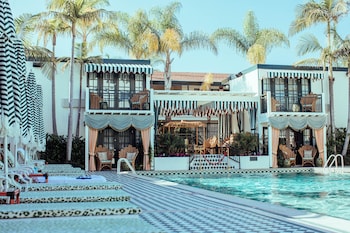 Outdoor pool, open 7:00 AM to 9:00 PM, cabanas (surcharge)