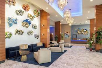 Studio, 2 Queen Beds, City View | Desk, laptop workspace, iron/ironing board, free cots/infant beds