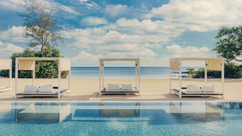 3 outdoor pools, open 9:00 AM to 6:00 PM, free cabanas, pool umbrellas