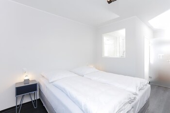 Basic Double Room | Living area | Flat-screen TV