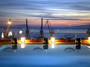 Indoor pool, seasonal outdoor pool, pool umbrellas, pool loungers