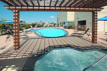 Outdoor pool, pool umbrellas, sun loungers