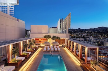 Seasonal outdoor pool, pool cabanas (surcharge), pool umbrellas