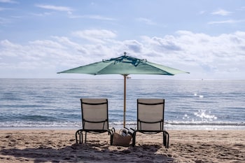 2 outdoor pools, pool umbrellas, sun loungers