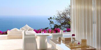 Outdoor pool, open 8:00 AM to 8:00 PM, pool umbrellas, pool loungers