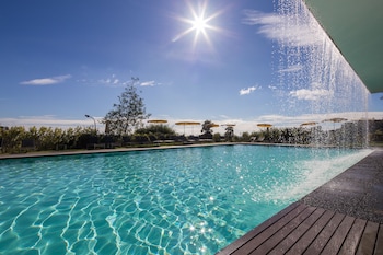 2 outdoor pools, open 9:00 AM to 7:00 PM, pool umbrellas, sun loungers