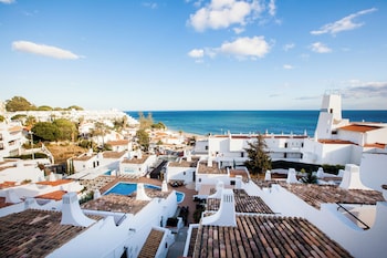 2 outdoor pools, pool umbrellas, sun loungers