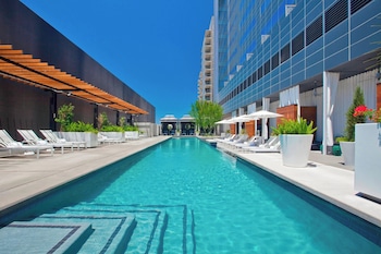 Outdoor pool, open 7:00 AM to 8:00 PM, cabanas (surcharge)