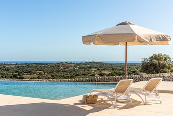 Seasonal outdoor pool, pool umbrellas, sun loungers