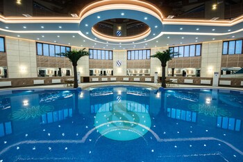 Indoor pool, open 9:00 AM to 12:30 AM, sun loungers