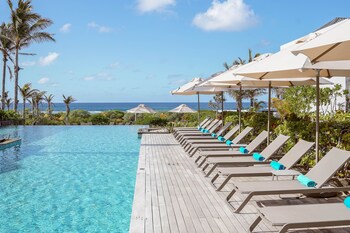 2 outdoor pools, pool umbrellas, sun loungers
