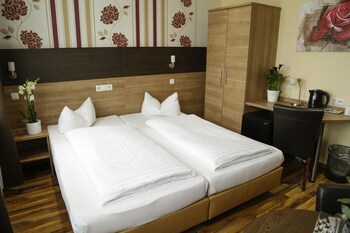 Habitación con 1 cama matrimonial o 2 individuales | Minibar, escritorio, cortinas blackout y insonorización 