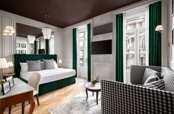 Chambre Deluxe, vue sur la ville | Couette en duvet, minibar, coffre-fort pour ordinateur portable, bureau