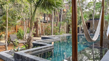 Outdoor pool, open 9:00 AM to 9:00 PM, pool loungers