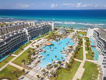 2 outdoor pools, open 7:00 AM to 7:00 PM, cabanas (surcharge)
