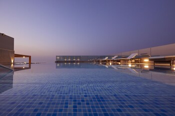 Outdoor pool, open 7:00 AM to 8:00 PM, pool umbrellas, sun loungers