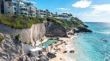 4 outdoor pools, open 8:00 AM to 8:00 PM, pool umbrellas, sun loungers