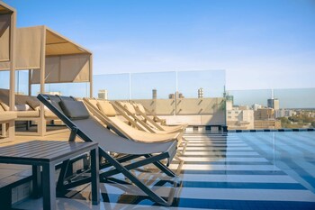 Outdoor pool, sun loungers