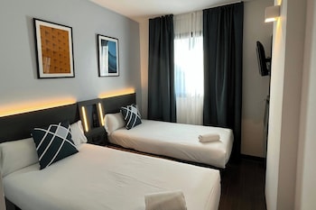 Room, 2 Single Beds | Desk, blackout curtains, soundproofing, iron/ironing board