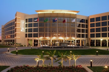 Outdoor pool, open 7:00 AM to 9:00 PM, pool umbrellas, sun loungers