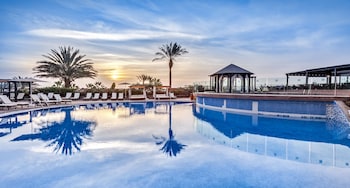 2 outdoor pools, pool umbrellas, pool loungers