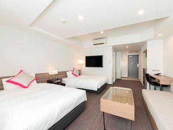 Premium bedding, down duvets, memory-foam beds, in-room safe