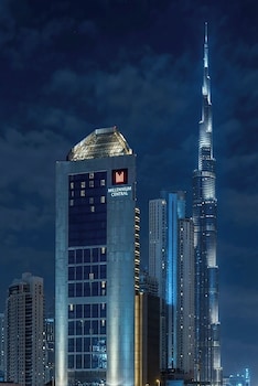 Premium Room, 1 King Bed (Skyline View) | Minibar, in-room safe, desk, laptop workspace