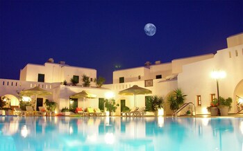 Seasonal outdoor pool, open 11 AM to 8 PM, pool umbrellas, sun loungers