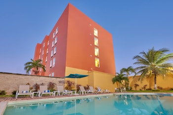 Outdoor pool, open 8:00 AM to 8:00 PM, pool umbrellas, sun loungers