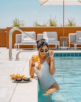 Outdoor pool, open 8:00 AM to 10:00 PM, cabanas (surcharge)