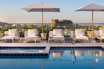 Outdoor pool, open 8:00 AM to 10:00 PM, cabanas (surcharge)