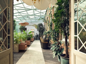 Indoor pool, open 7:00 AM to 10:00 PM, sun loungers