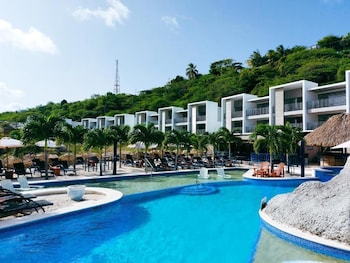 2 outdoor pools, open 8:00 AM to 10:00 PM, pool umbrellas, sun loungers